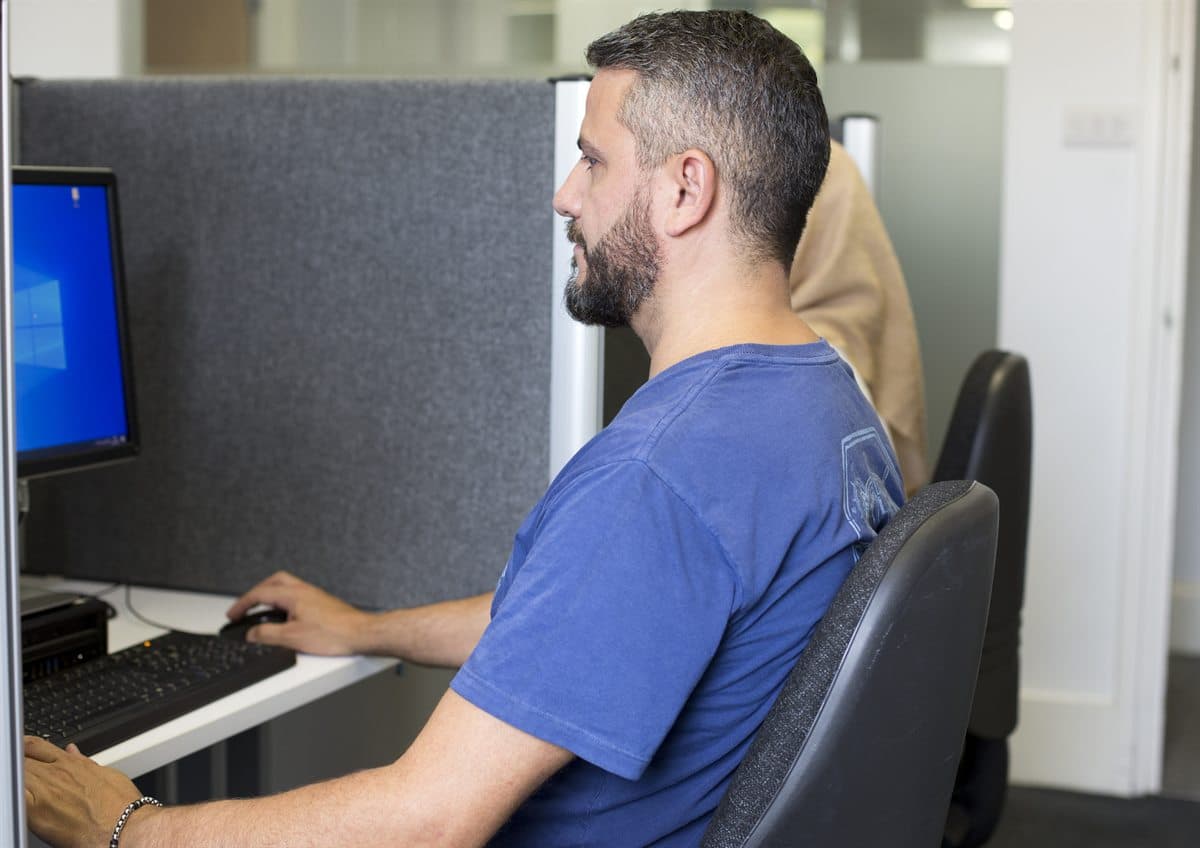 Student practising on a computer at an MTS workstation